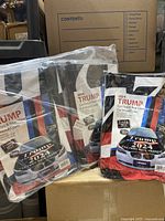Six sets of Trump 2024 car flags, rear view mirror covers, and hood covers packaged in plastic with visible labels and designs showing product usage on a car.