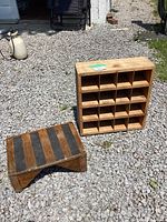Photo showing both the wood organizer and the wood step stool on gravel ground outside.