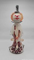 Front view of the Murano-style clown figurine showing full body and face details.