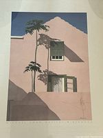 Close-up of the print showing the pink building with two windows and shadows of a tree, signed by Michael Swan.