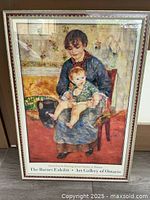 Frontal view of the framed print showing the entire artwork with the matting and frame, highlighting the title and exhibition information beneath the image.