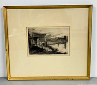 Full view of vintage framed print showing artwork and gold-colored frame with cream matting.