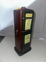 Front side showing Fire Chief labels and coin slot on top