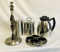 Picture of the full kitchen set including paper towel holder, coffee pot, storage jars, and poached egg holders on tray