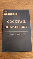 Box front showing Eocolz Cocktail Shaker Set 17-piece bar set branding.