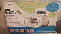 Box of Cricut Create machine front with product details and price sticker