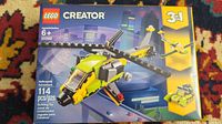Front of unopened Lego Creator 31092 box showing helicopter model and set details.