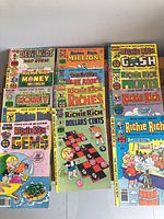 All 13 Richie Rich comic books arranged to show multiple cover titles, illustrating lot condition and variety.