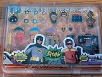 Front view of unopened package showing all accessories and character images from the 1966-1968 Batman Classic TV series.