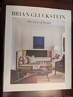Front cover of the hardcover book showing an interior living room design.