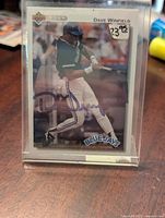 Front of 1992 Upper Deck baseball card showing Dave Winfield batting in Blue Jays uniform with autograph.