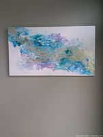Front view of original abstract acrylic painting by Jose Laberge on white canvas with blue, purple, aqua, and gold tones.