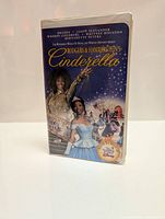 Front view of the VHS tape case showing the title and character images.