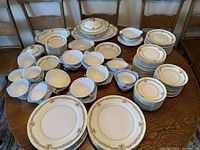 Full view of the Noritake Gloria dinnerware set arranged on table