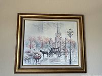 Full view of vintage framed painting showing castle, horse carriage, and park scene.
