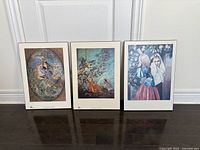 Photo of three Persian inspired art prints 13x19 inches on floor against wall