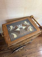 Top view showing stained glass inset pattern and metal handles