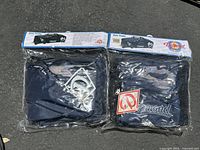 Two Diamond Pro Tote bags in original sealed plastic packaging with header card showing product features and branding.