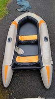 Top view of fully inflated Aquarius 896 boat showing interior seats and hard floor