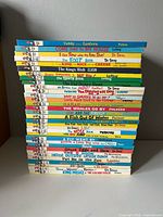 Stack of 33 hardcover Beginner Books showing spines and titles