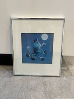 Front view of framed Michael Bedard print showing artwork, mat and metal frame