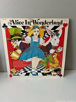 Front cover of Alice In Wonderland vinyl LP showing artwork and title