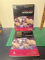 Cartridge, manual, and box front displayed