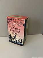 Front/side view of slipcase with title text