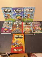 Front covers of all eight books displayed