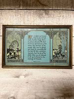 Front view showing printed poem, illustration and frame