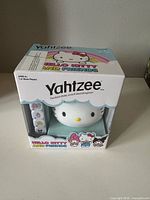 Front view of sealed Hello Kitty Yahtzee box