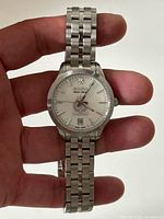 Front view showing dial, bezel, bracelet