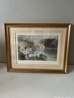 Front view of framed print showing artwork, mats, and frame