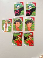Fronts of all seven Pokémon Topps Heroes & Villains cards