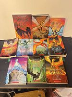 Front covers of all ten Wings of Fire paperbacks displayed
