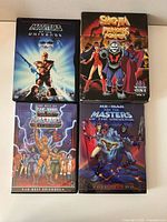 Front covers of all four DVD cases