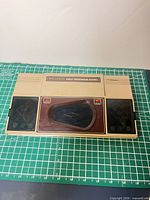 Top view of entire tabletop game showing display window and both keypad covers closed