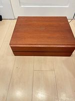 Closed teak vanity module front view