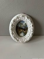 Front view of oval framed miniature oil painting