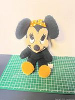 Front view of vintage Minnie Mouse plush showing colors and overall condition