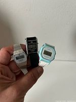 All three watches held together
