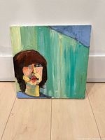 Full view of unframed acrylic portrait on canvas
