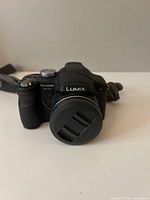 Front view with lens cap attached