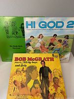 Front covers of all three records visible