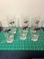 Front view of five of the six Beau’s pint glasses
