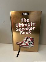 Front cover showing title and gold dust jacket