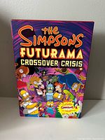 Front of slipcase showing title and characters