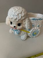 Front view of ceramic lamb planter