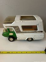 Side view of Tonka camper truck showing decals and dimensions