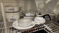 Full set of Corningware with Cornflower Blue pattern including casseroles, teapot, pie plate, and long handled baking dish with lids